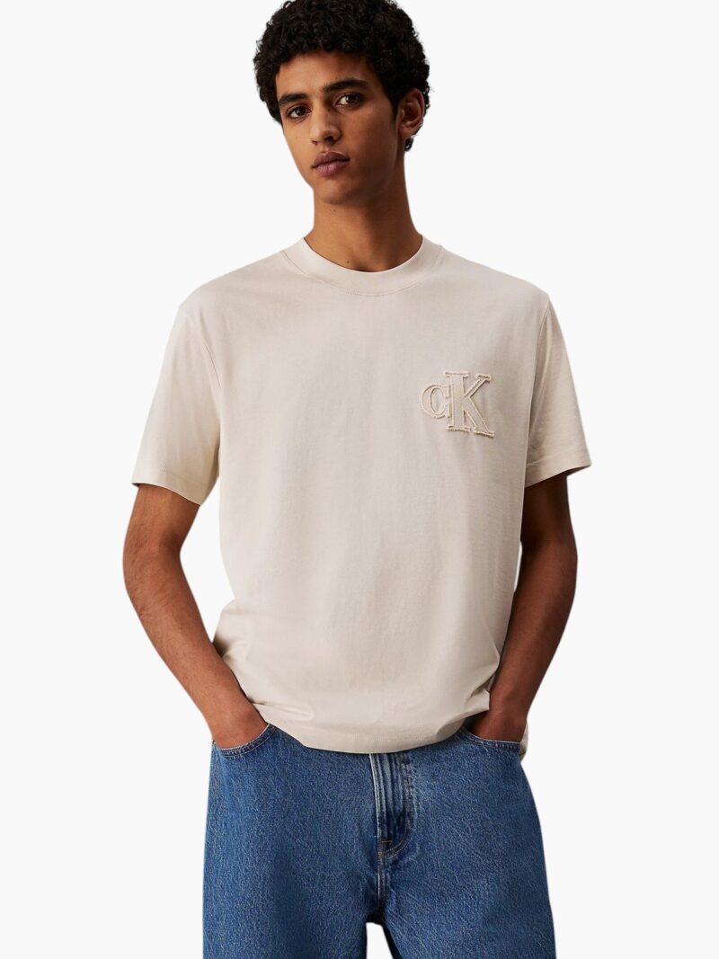 T-shirt con logo applicato